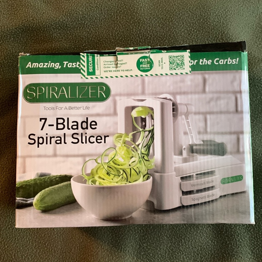 Spiralizer 7- blade spiral slicer. Comes with 7 interchangeable blade styles.